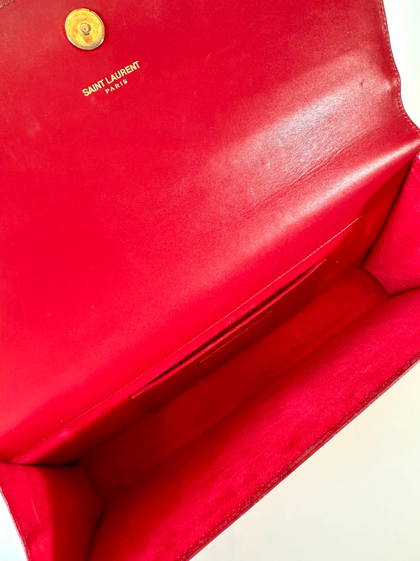 Saint Laurent red clutch