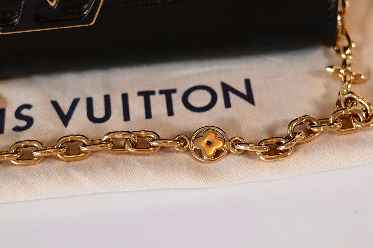 Louis Vuitton Capucines Clutch Black