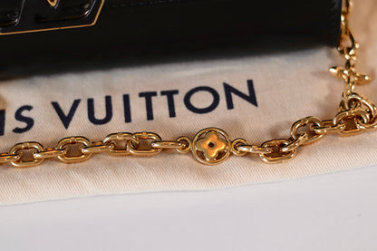 Louis Vuitton Capucines Clutch Black