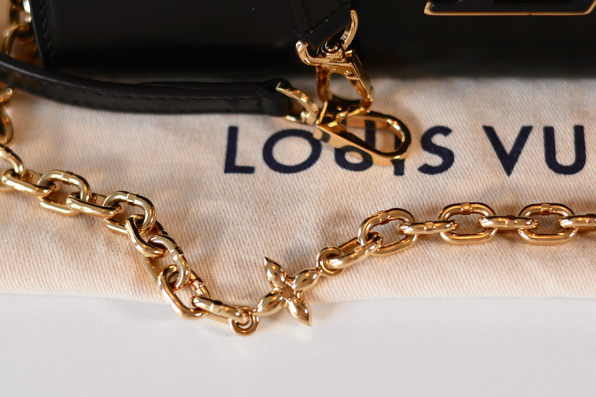 Louis Vuitton Capucines Clutch Black