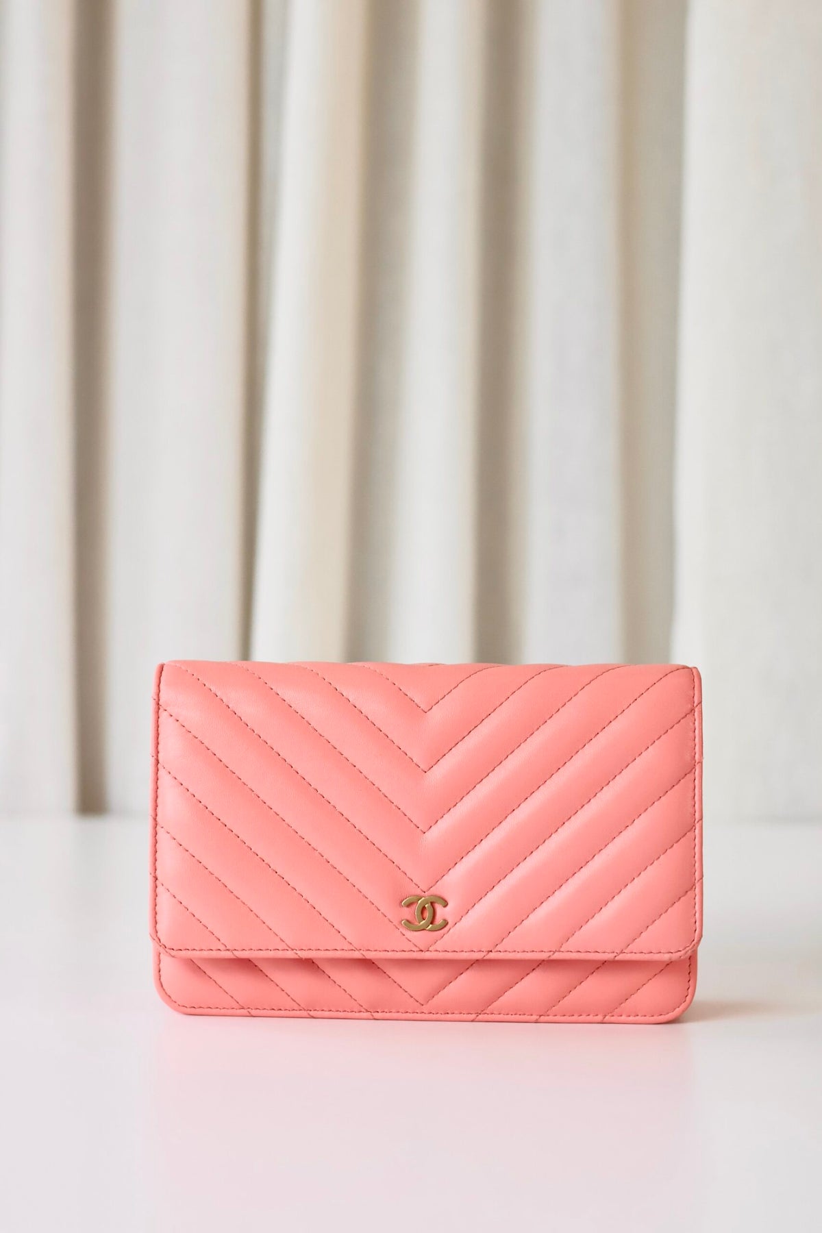 Chanel pink wallet on chain