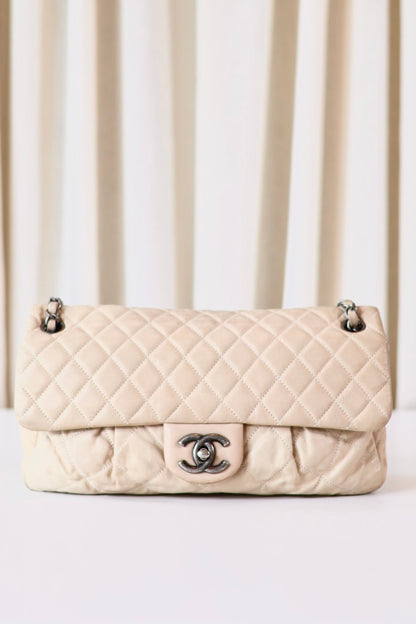 Chanel single flap bag beige