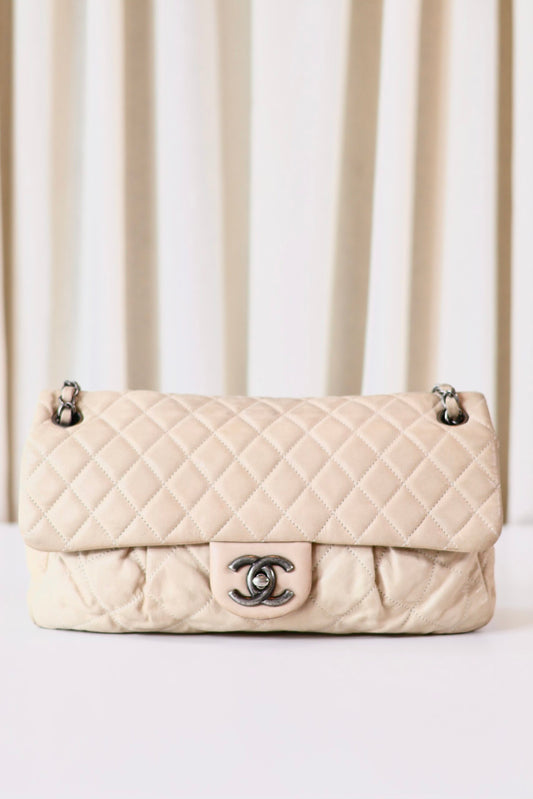 Chanel single flap bag beige