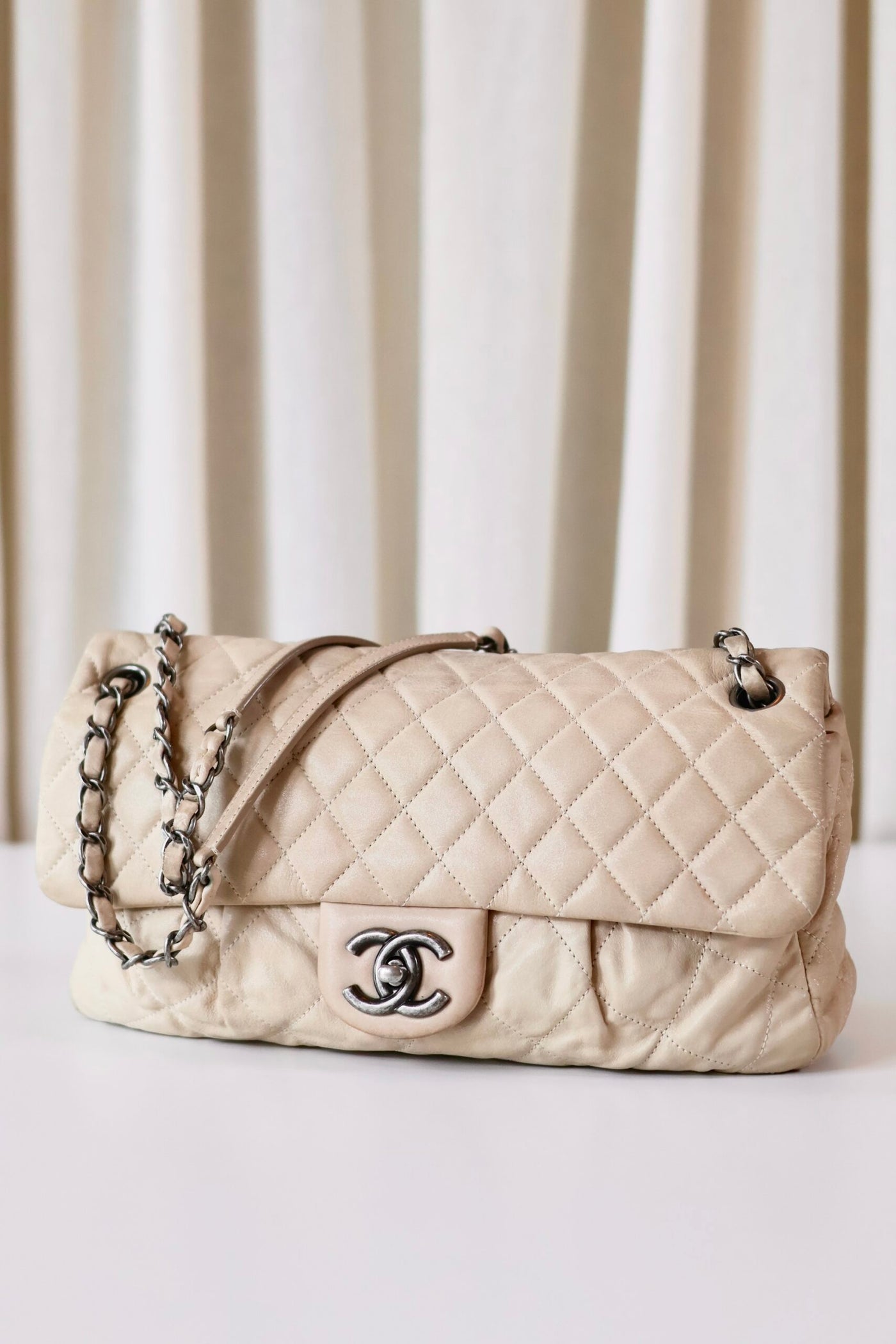 Chanel single flap bag beige