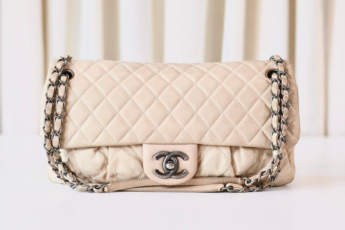 Chanel single flap bag beige