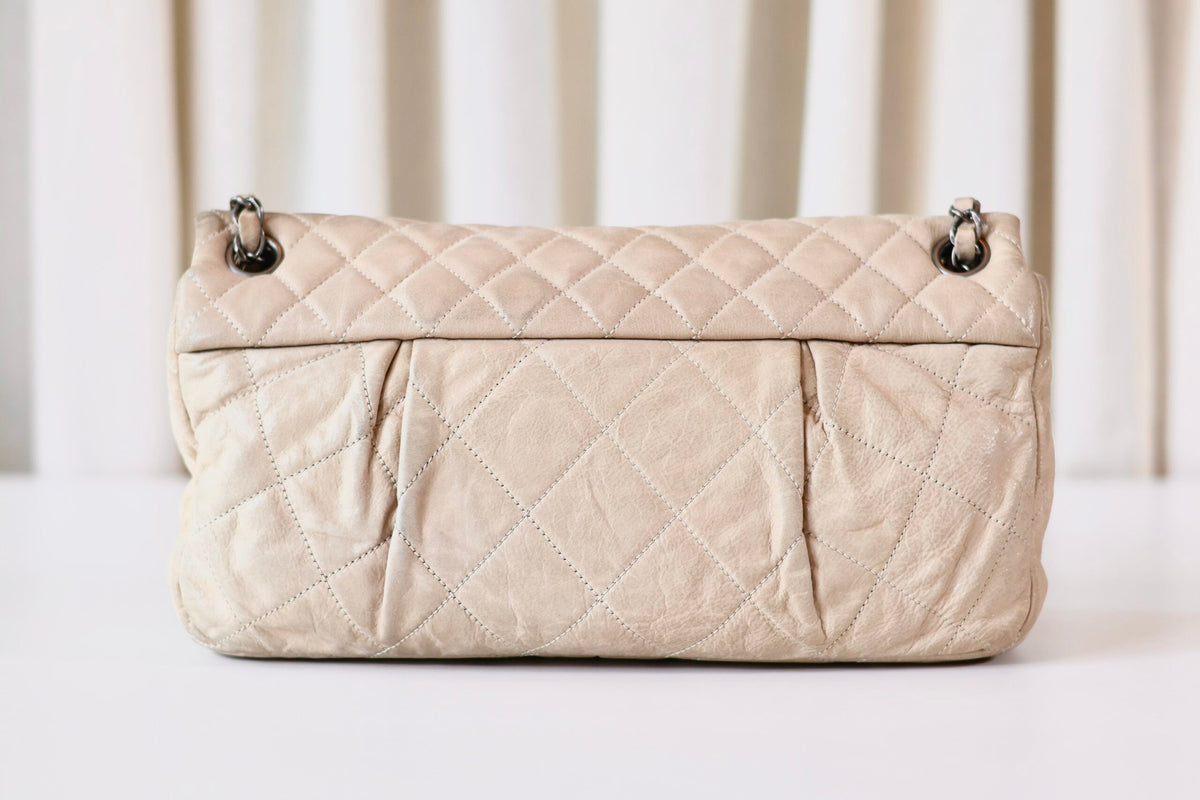 Chanel single flap bag beige