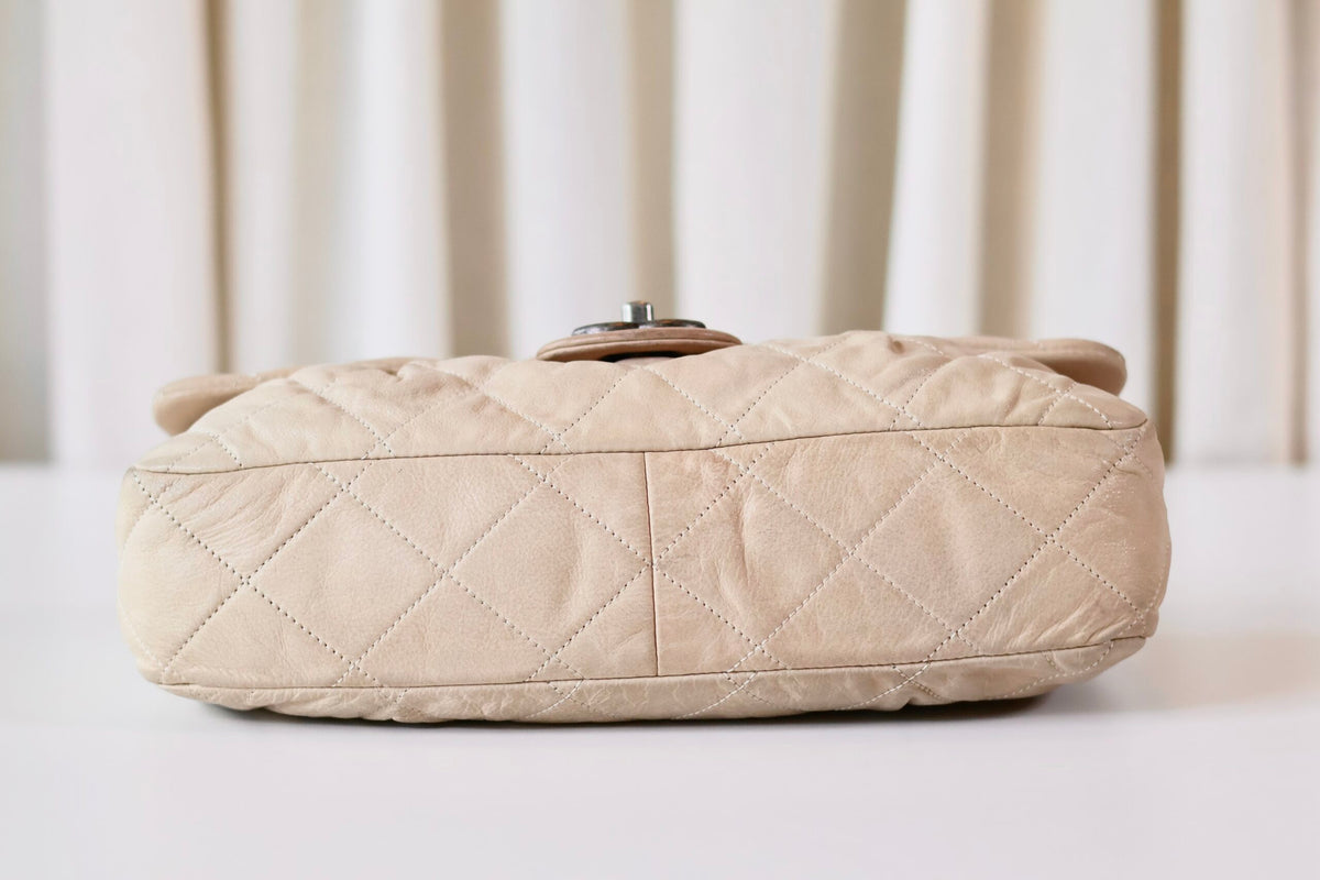Chanel single flap bag beige