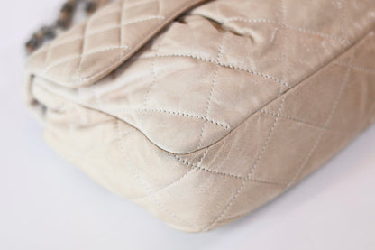 Chanel single flap bag beige