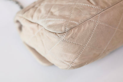 Chanel single flap bag beige
