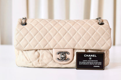 Chanel single flap bag beige