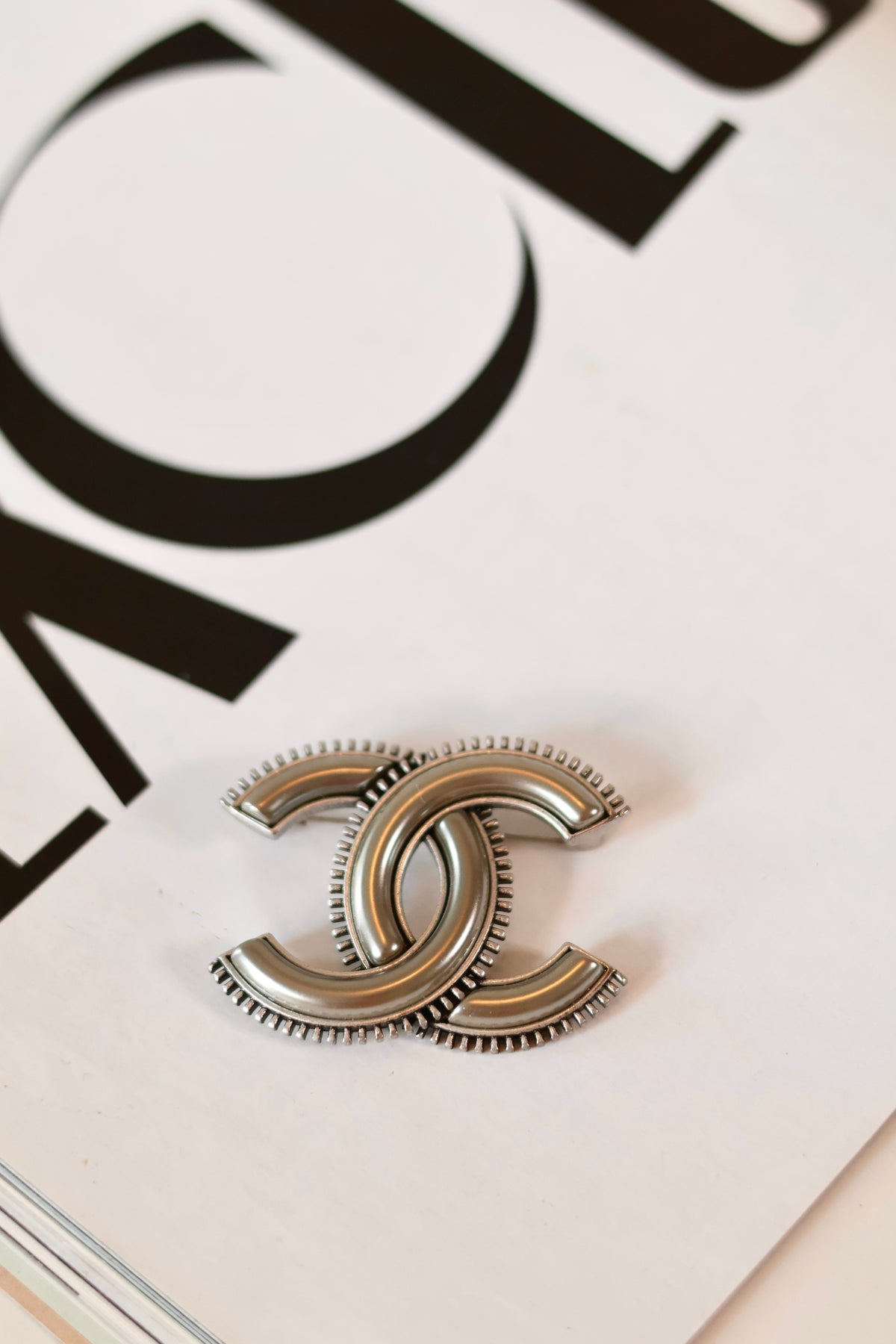 Chanel chrome brooch