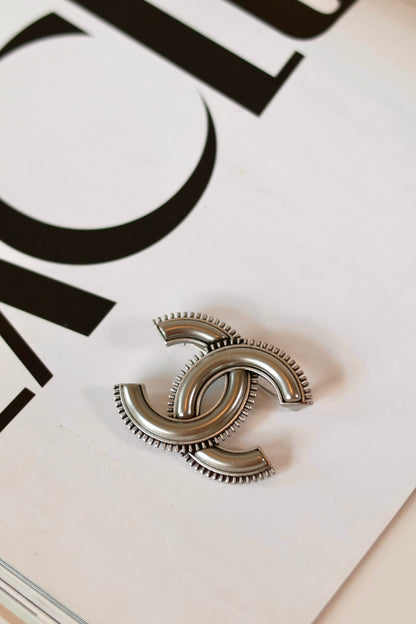 Chanel chrome brooch