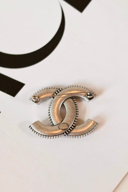 Chanel chrome brooch