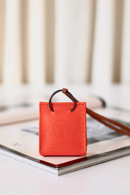 Hermes orange bag charm