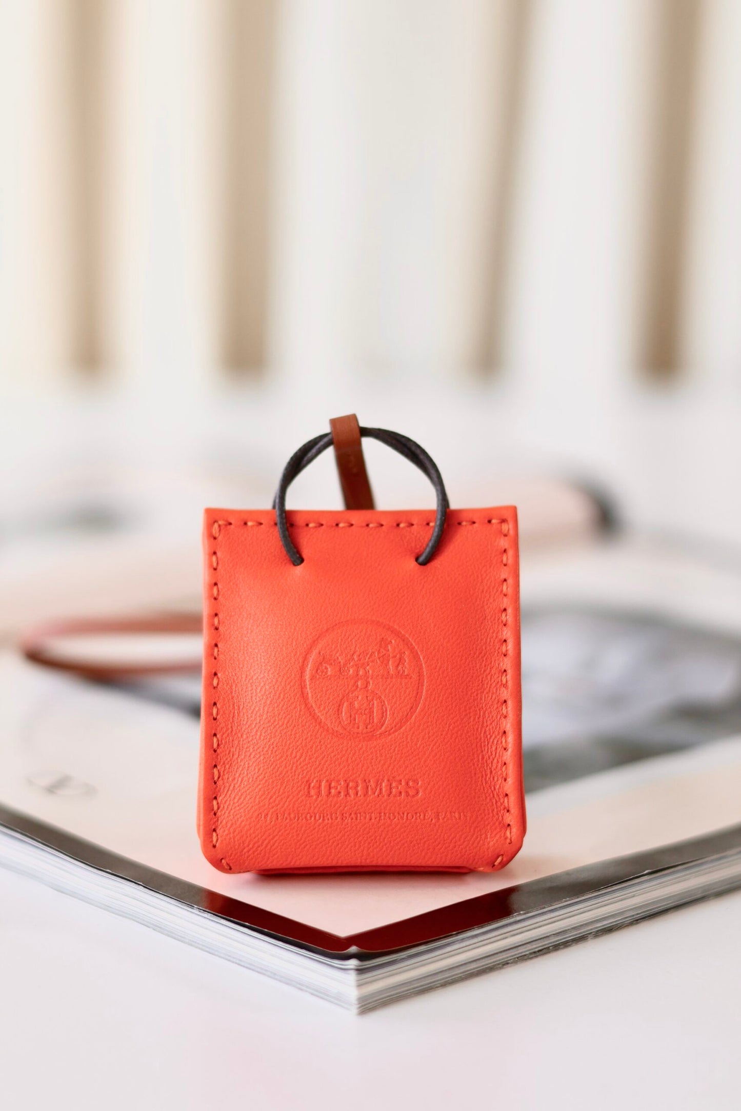 Hermes orange bag charm