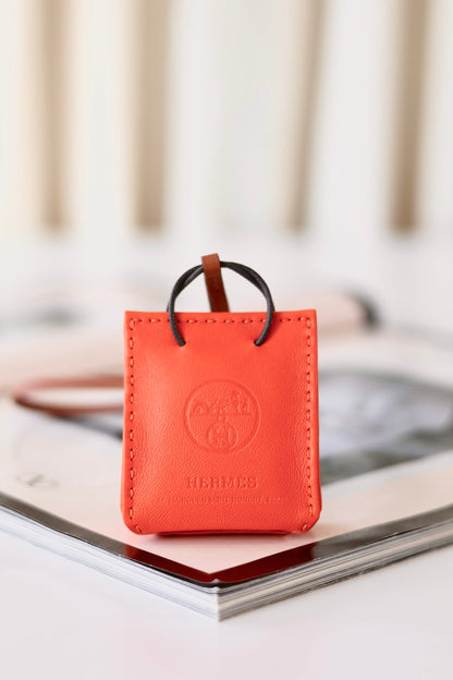 Hermes orange bag charm