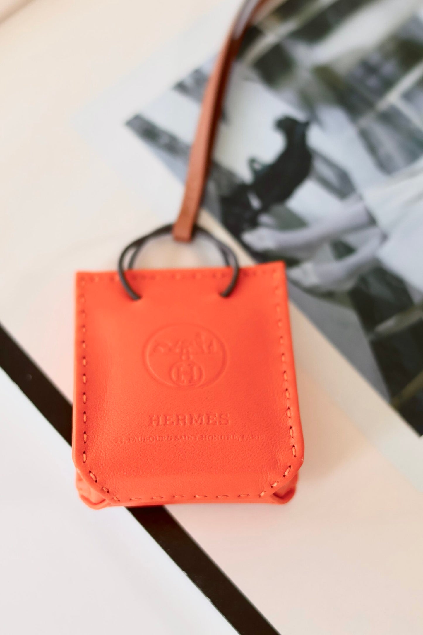 Hermes orange bag charm