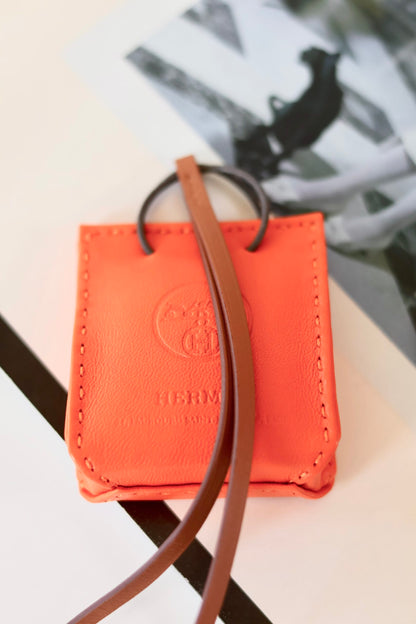 Hermes orange bag charm