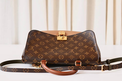 Louis Vuitton Lock handbag monogram