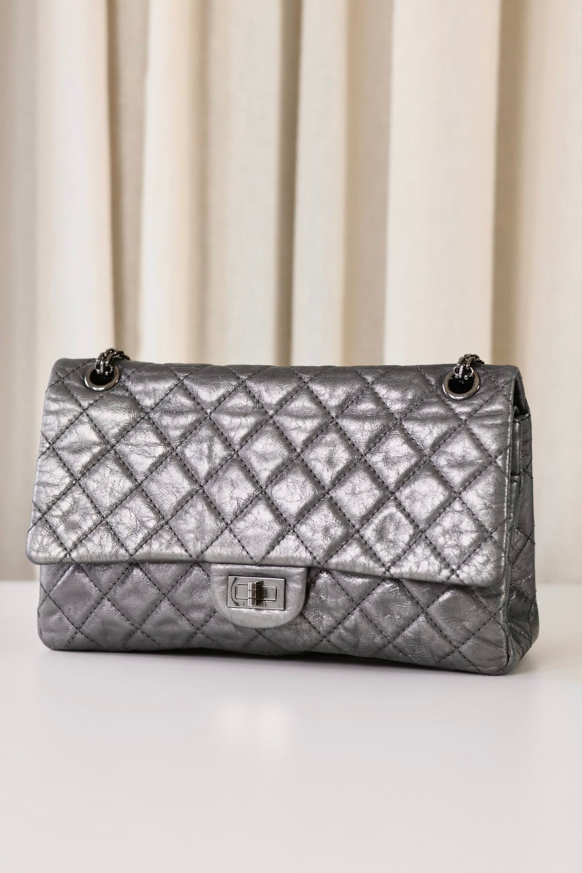 Chanel Reissue medium metallic grey/silver