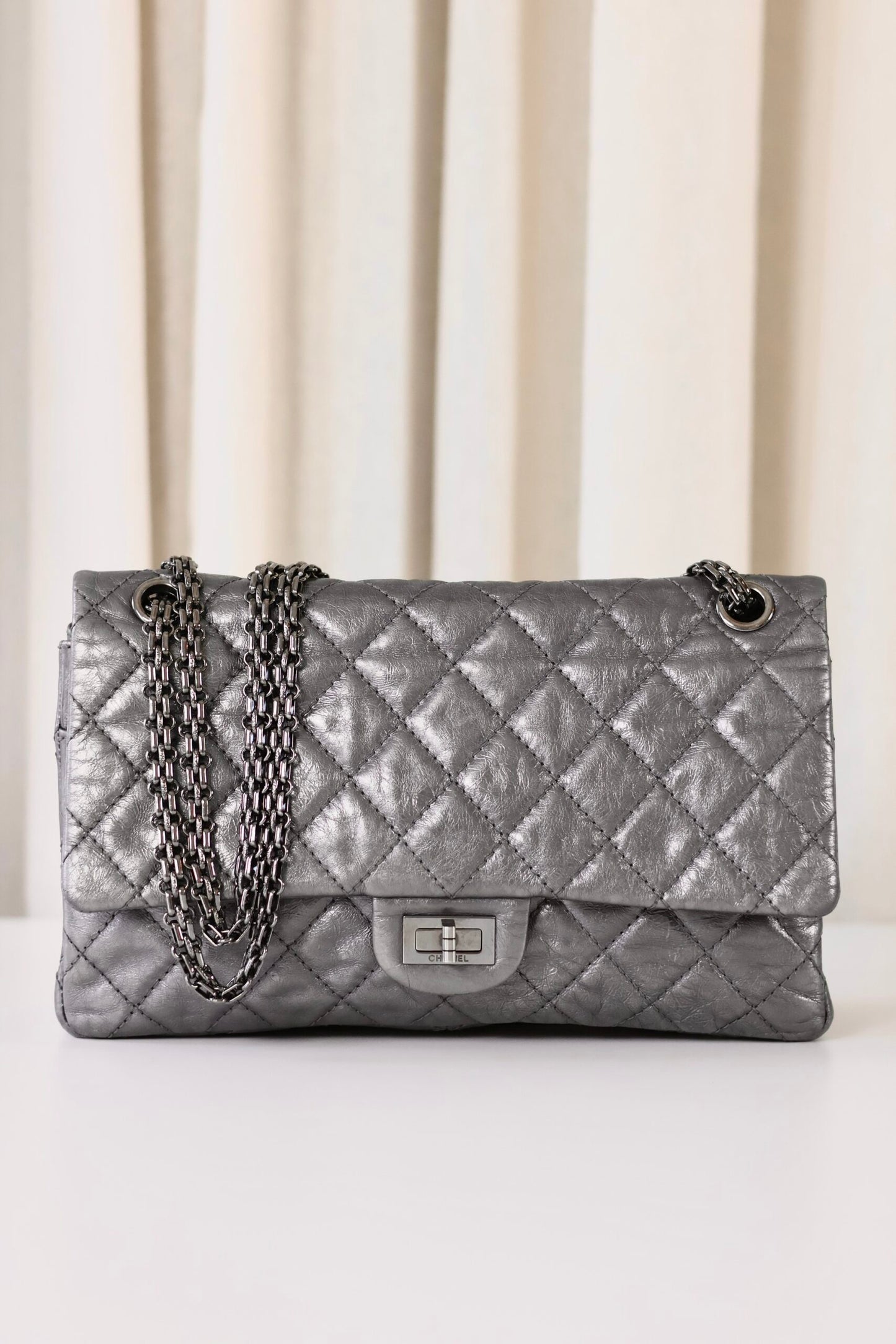 Chanel Reissue medium metallic grey/silver