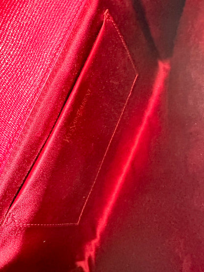 Saint Laurent pink clutch