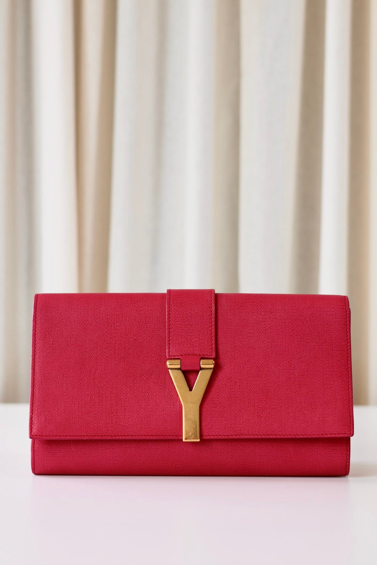 Saint Laurent pink clutch
