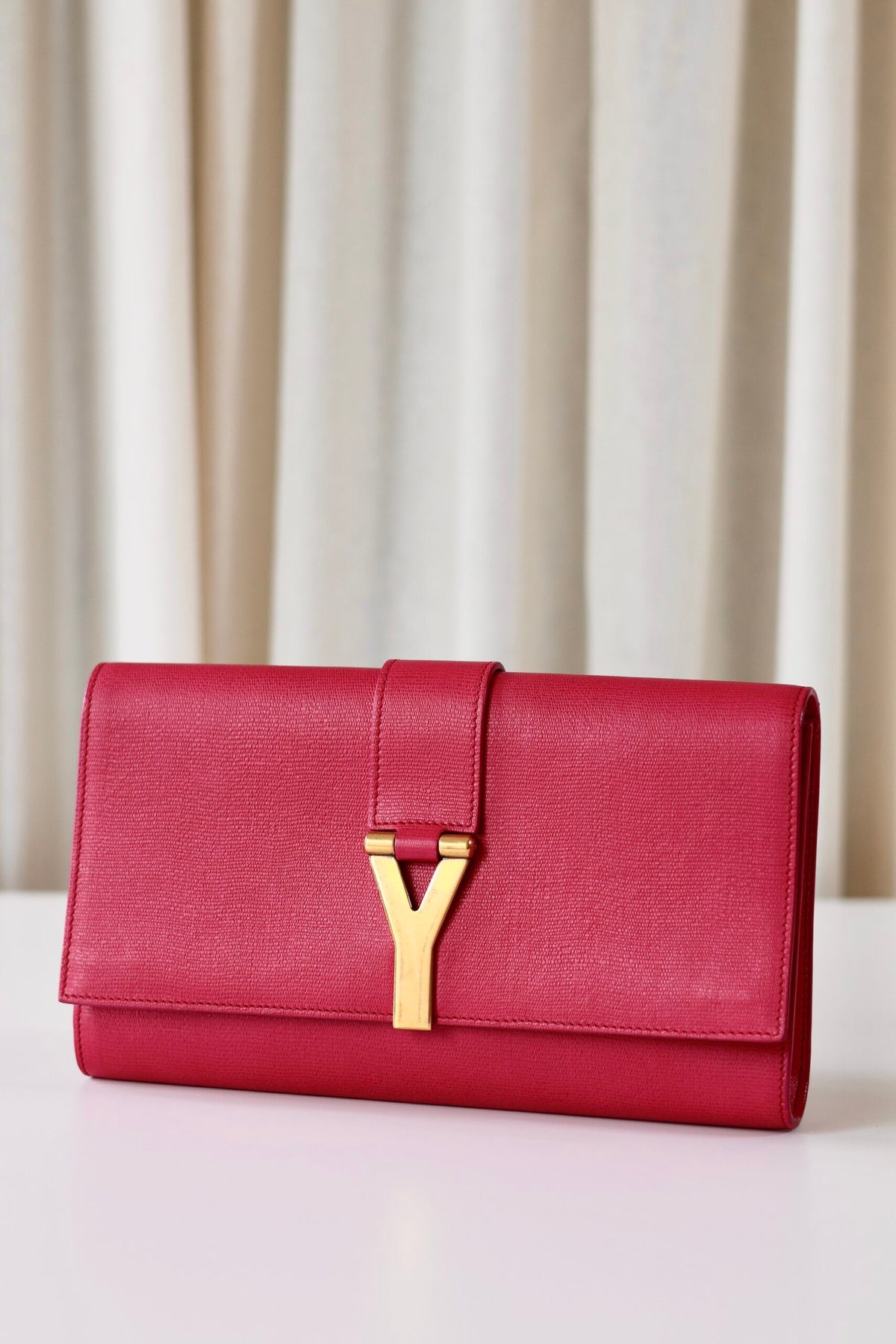 Saint Laurent pink clutch