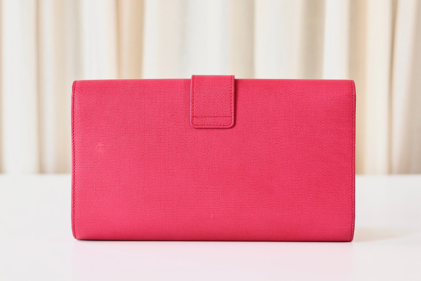 Saint Laurent pink clutch