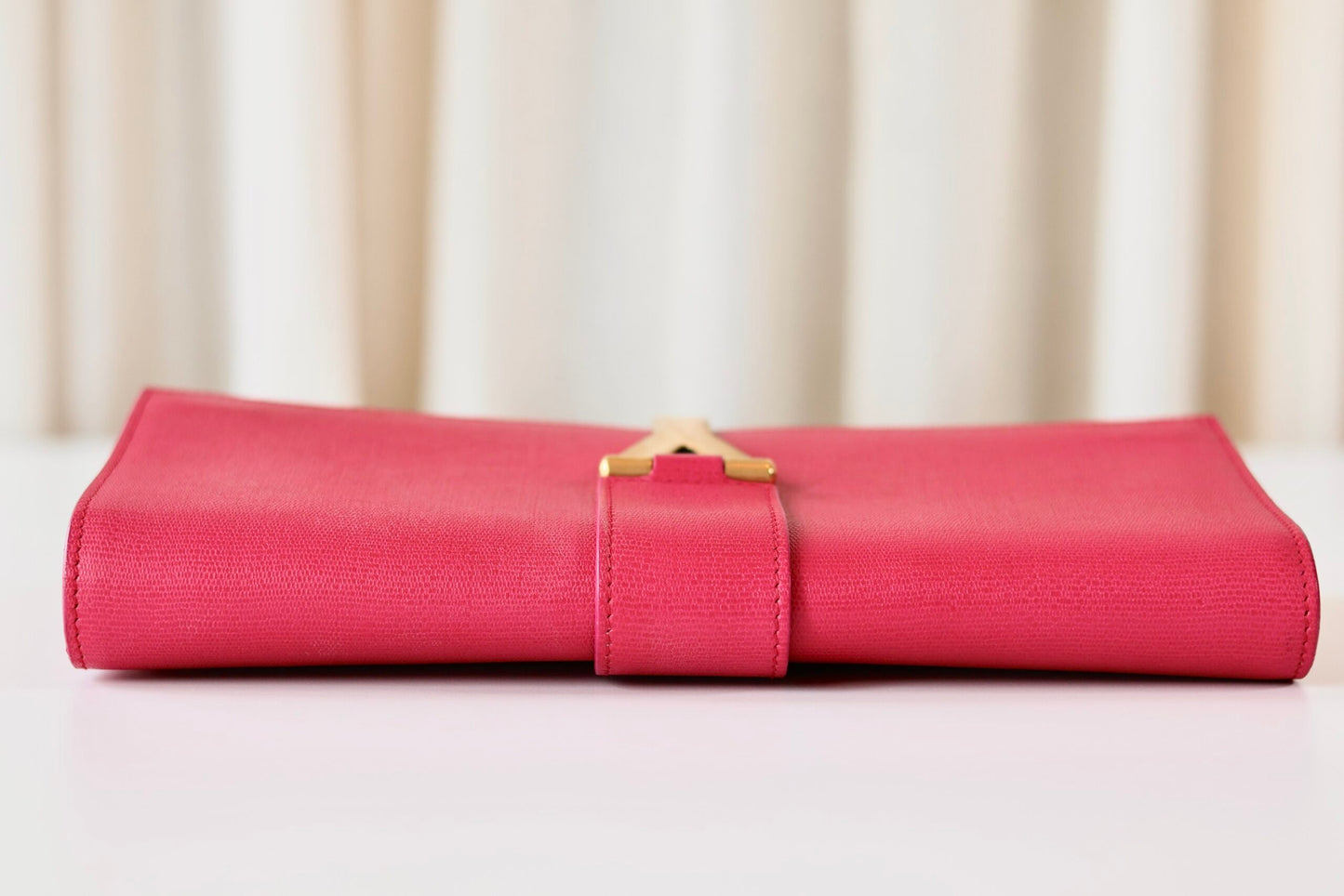 Saint Laurent pink clutch