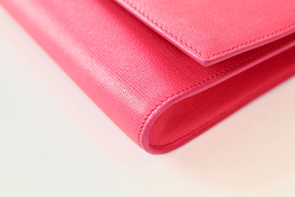 Saint Laurent pink clutch