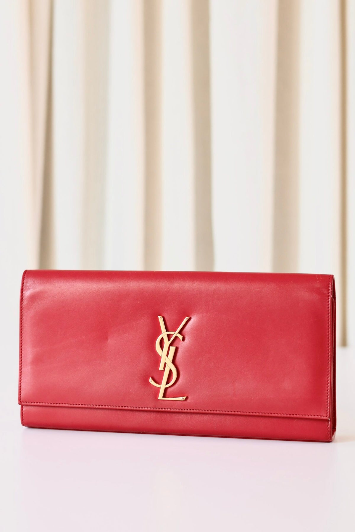 Saint Laurent red clutch