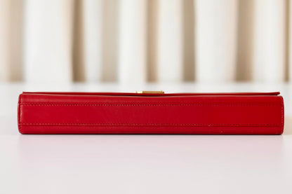 Saint Laurent red clutch