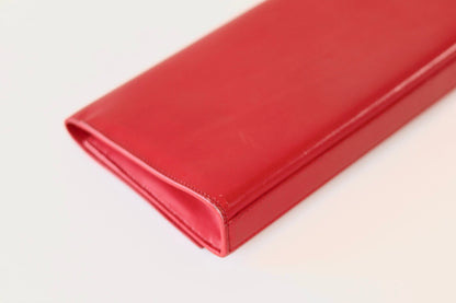 Saint Laurent red clutch
