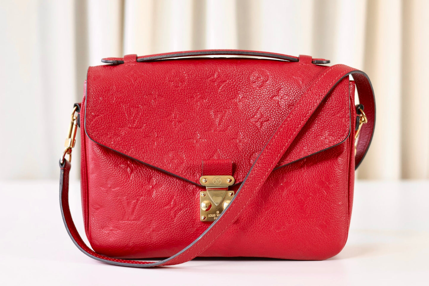 Louis Vuitton Pochette Metis red