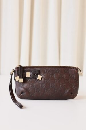 Gucci brown monogram pouch