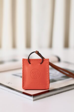 Hermes orange bag charm