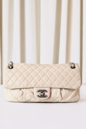 Chanel single flap bag beige
